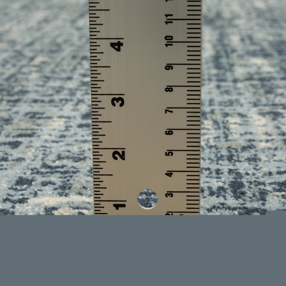 7' X 9' Blue And Beige Abstract Area Rug