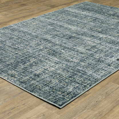 7' X 9' Blue And Beige Abstract Area Rug