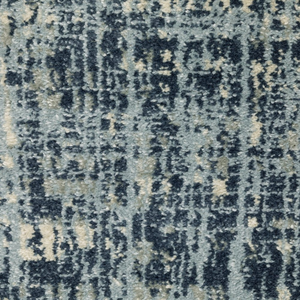 7' X 9' Blue And Beige Abstract Area Rug
