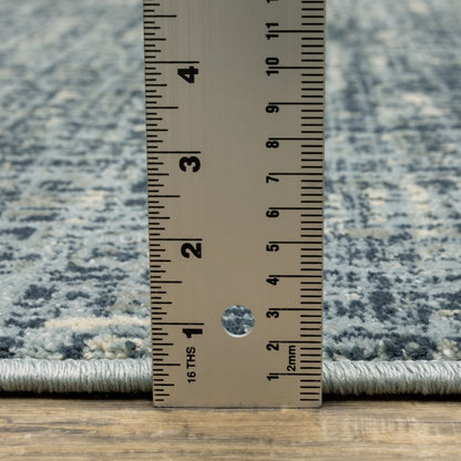 7' X 9' Blue And Beige Abstract Area Rug