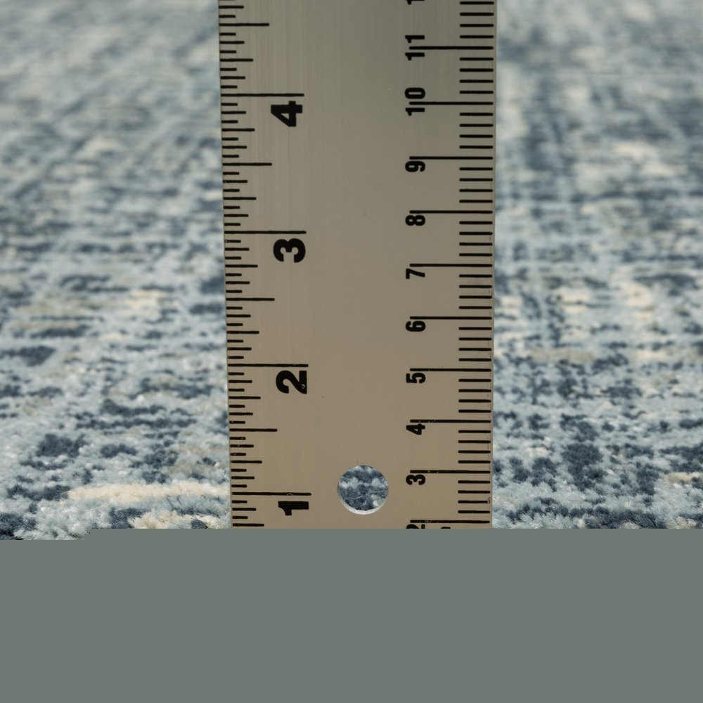 7' X 9' Blue And Beige Abstract Area Rug