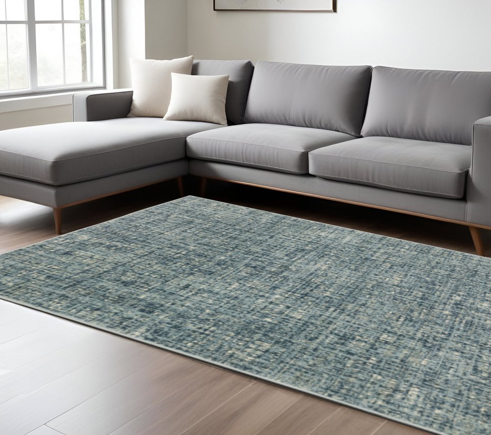8' X 10' Dark Blue Light Blue Grey Ivory And Beige Abstract Power Loom Stain Resistant Area Rug
