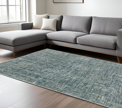 8' X 10' Dark Blue Light Blue Grey Ivory And Beige Abstract Power Loom Stain Resistant Area Rug