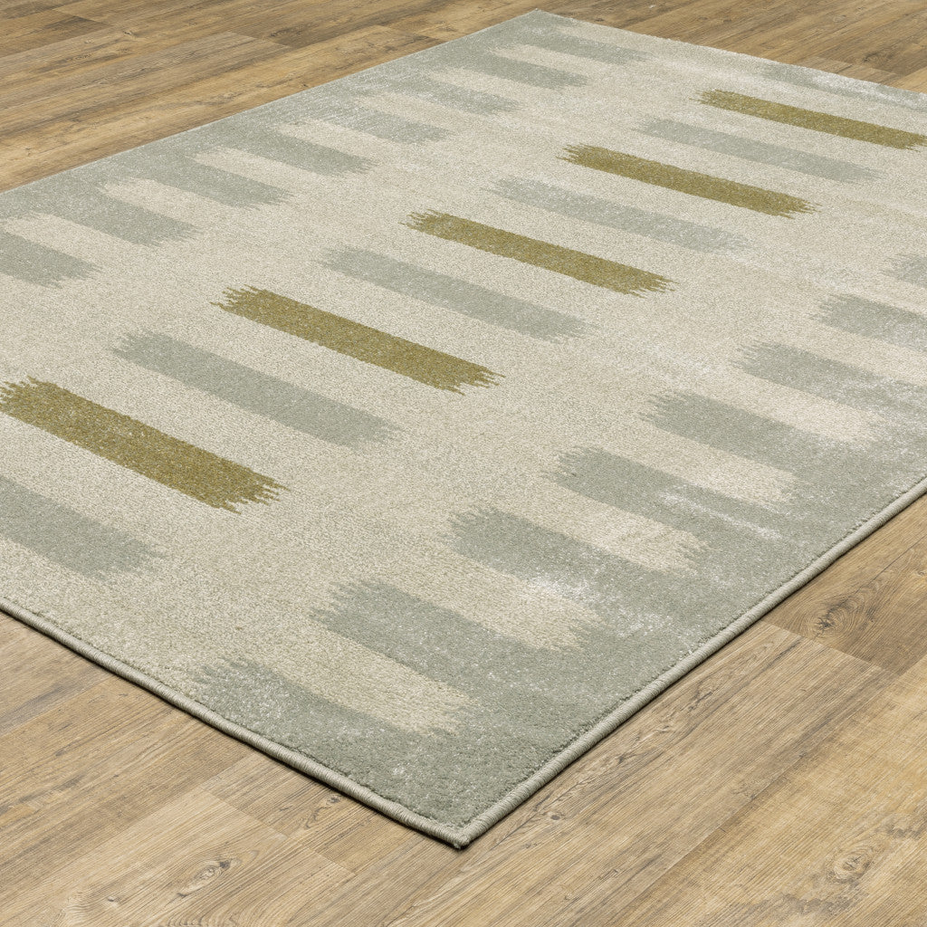 5' X 7' Beige Grey Gold And Green Geometric Power Loom Stain Resistant Area Rug