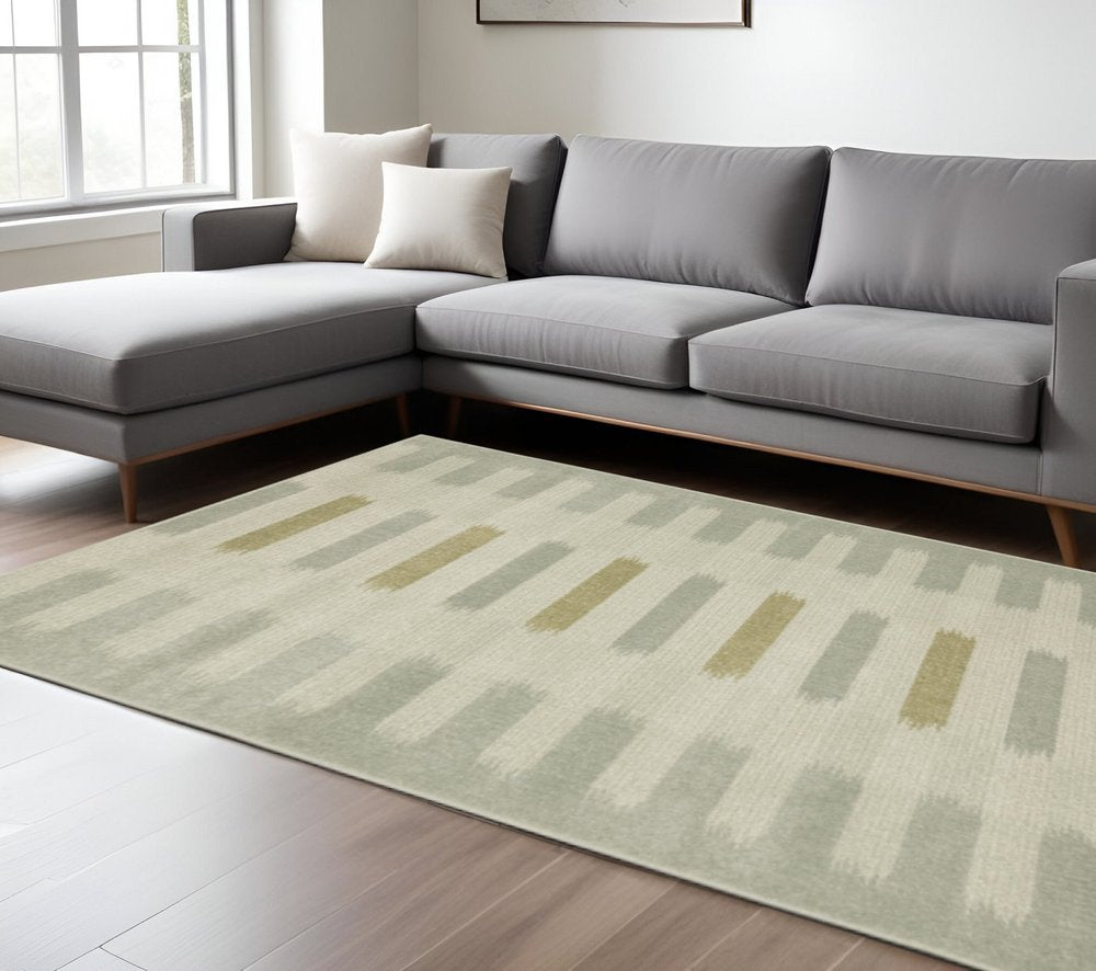 7' X 9' Beige And Ivory Geometric Area Rug