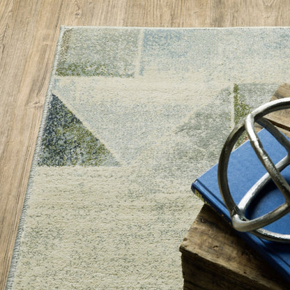 7' X 9' Gray And Ivory Geometric Area Rug