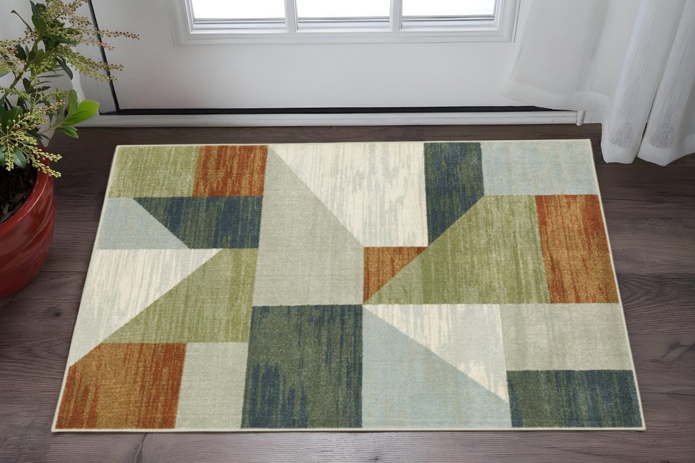 3' X 5' Grey Teal Blue Rust Green And Ivory Geometric Power Loom Stain Resistant Area Rug