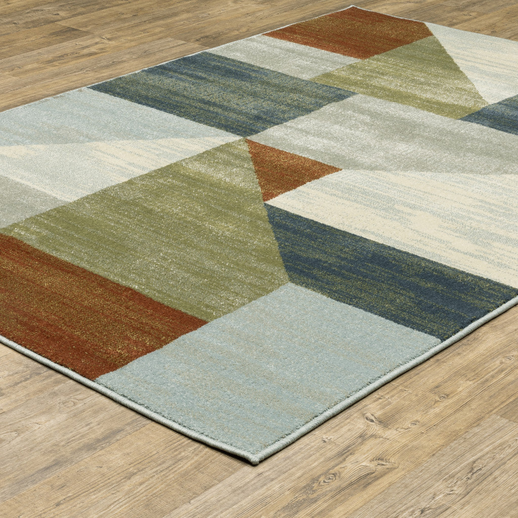 5' X 7' Grey Teal Blue Rust Green And Ivory Geometric Power Loom Stain Resistant Area Rug