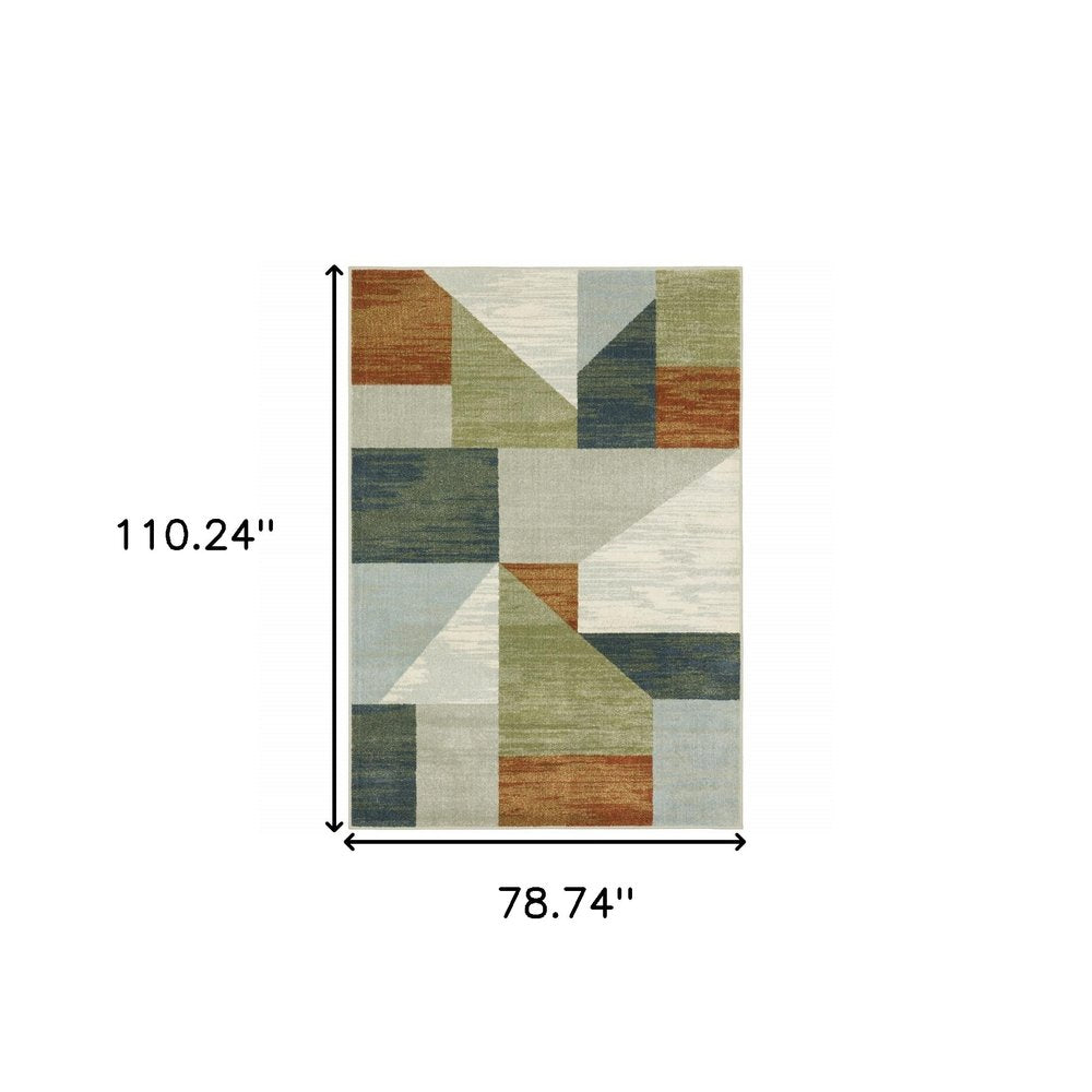 7' X 9' Gray And Ivory Geometric Area Rug