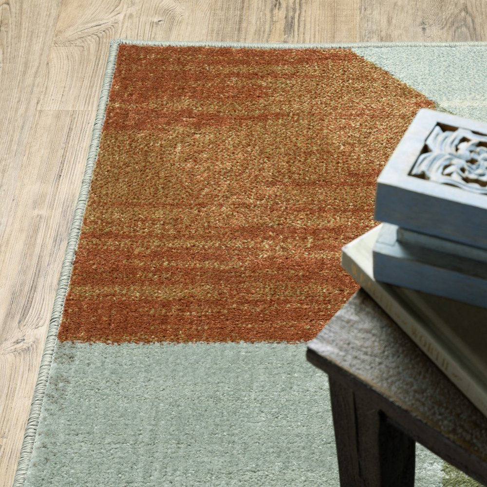 7' X 9' Gray And Ivory Geometric Area Rug