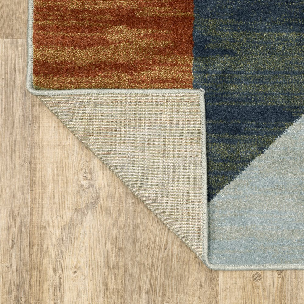 7' X 9' Gray And Ivory Geometric Area Rug