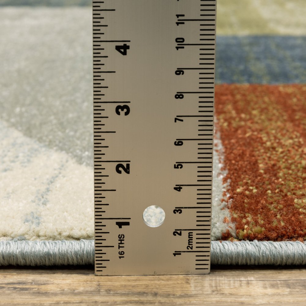 7' X 9' Gray And Ivory Geometric Area Rug