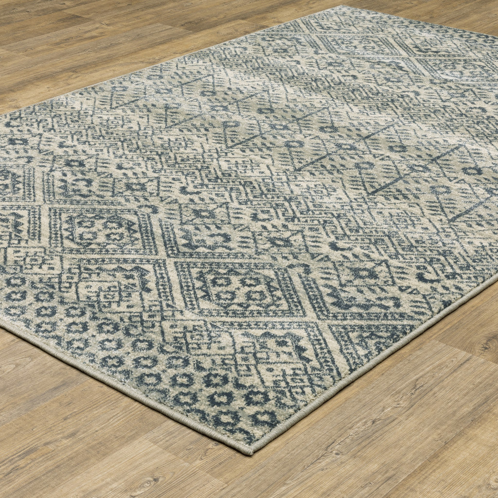 3' X 5' Blue And Beige Geometric Power Loom Stain Resistant Area Rug