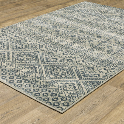 3' X 5' Blue And Beige Geometric Power Loom Stain Resistant Area Rug