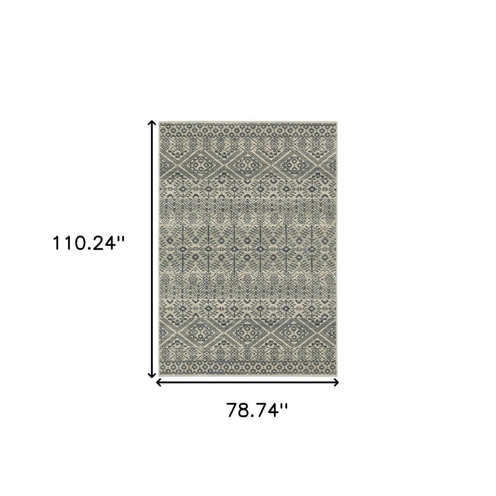 7' X 9' Blue And Beige Geometric Area Rug