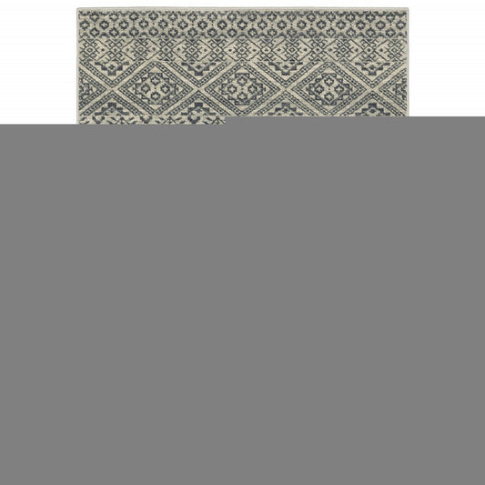 8' X 10' Blue And Beige Geometric Power Loom Stain Resistant Area Rug
