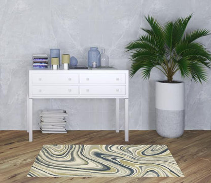 3' X 5' Ivory Blue And Beige Abstract Power Loom Stain Resistant Area Rug