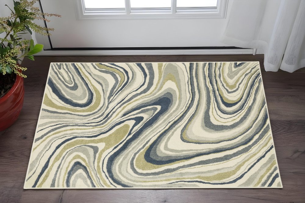 3' X 5' Ivory Blue And Beige Abstract Power Loom Stain Resistant Area Rug