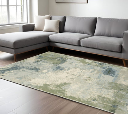 8' X 10' Blue Green Grey And Ivory Abstract Power Loom Stain Resistant Area Rug