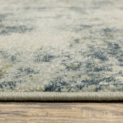 7' X 9' Beige And Ivory Abstract Area Rug