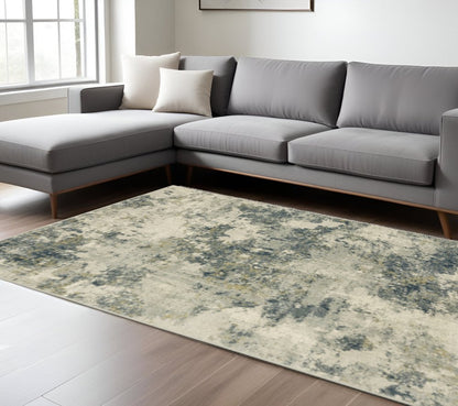 8' X 10' Beige Teal Grey And Gold Abstract Power Loom Stain Resistant Area Rug