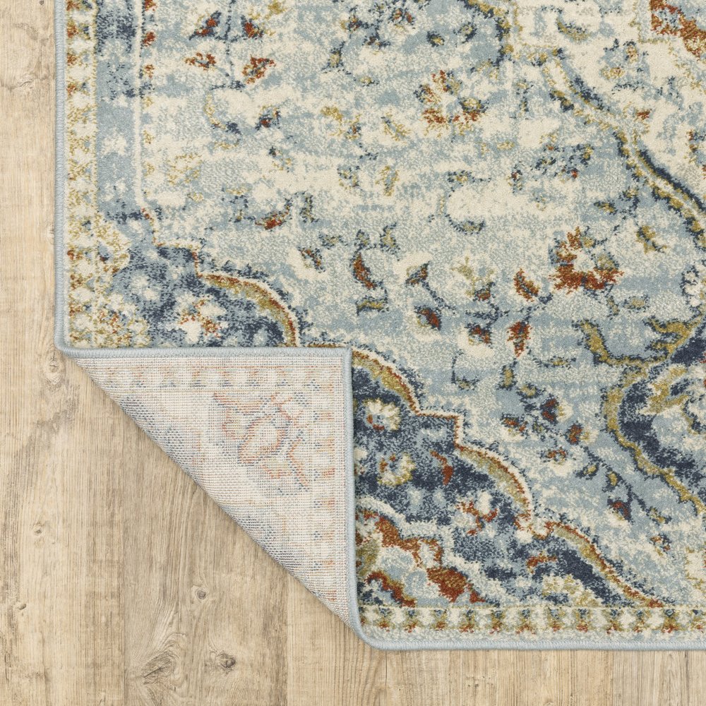 7' X 9' Blue And Beige Oriental Distressed Area Rug