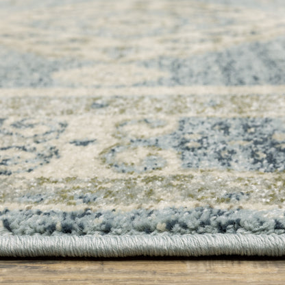 5' X 7' Blue Grey Beige And Teal Oriental Power Loom Stain Resistant Area Rug