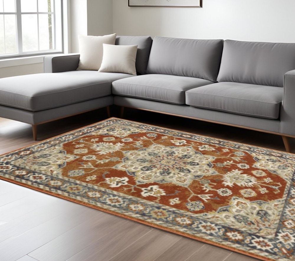 8' X 10' Rust Beige Teal Blue And Gold Oriental Power Loom Stain Resistant Area Rug
