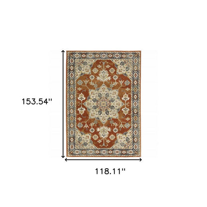 10' X 13' Rust Beige Teal Blue And Gold Oriental Power Loom Stain Resistant Area Rug