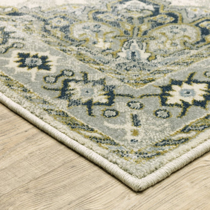 7' X 9' Ivory And Blue Oriental Distressed Area Rug