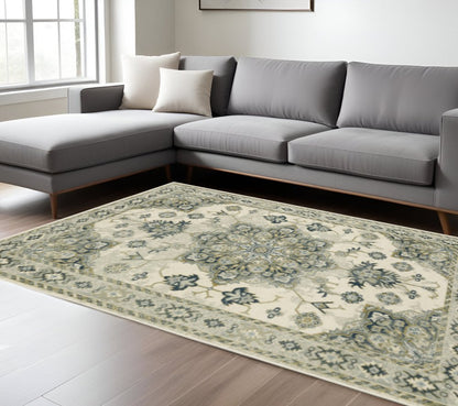 8' X 10' Ivory Blue Teal Grey And Olive Green Oriental Power Loom Stain Resistant Area Rug