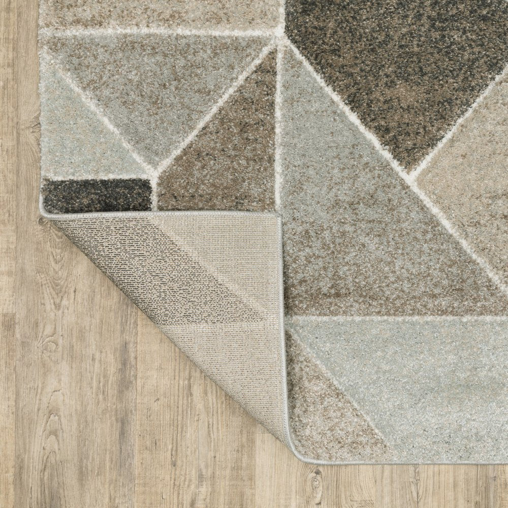 7' X 10' Gray And Ivory Geometric Area Rug