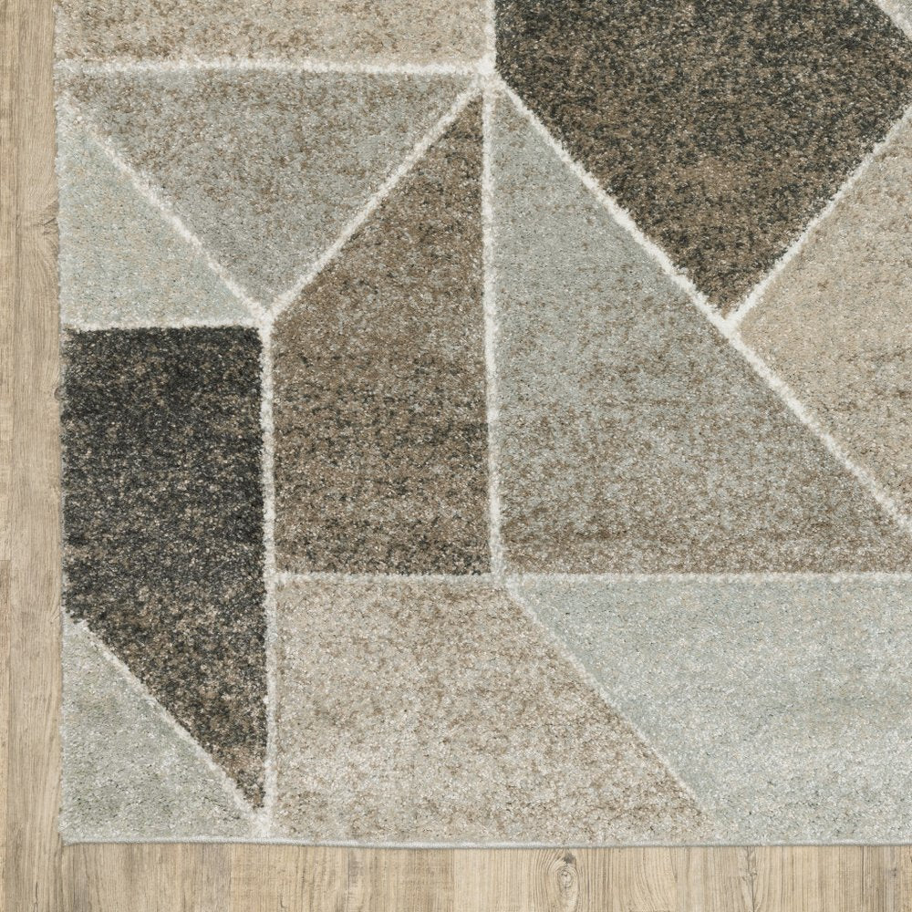 7' X 10' Gray And Ivory Geometric Area Rug