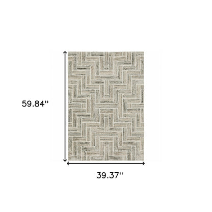 3' X 5' Ivory Beige Grey Brown Pale Blue And Charcoal Geometric Power Loom Stain Resistant Area Rug