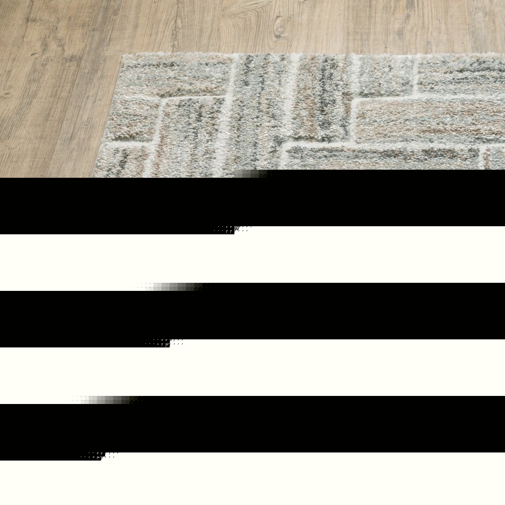 3' X 5' Ivory Beige Grey Brown Pale Blue And Charcoal Geometric Power Loom Stain Resistant Area Rug