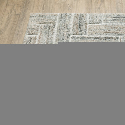 3' X 5' Ivory Beige Grey Brown Pale Blue And Charcoal Geometric Power Loom Stain Resistant Area Rug