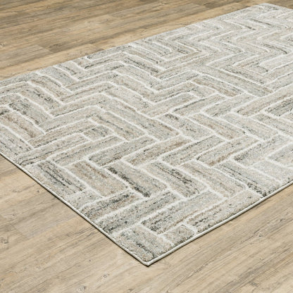 7' X 10' Ivory And Beige Geometric Area Rug