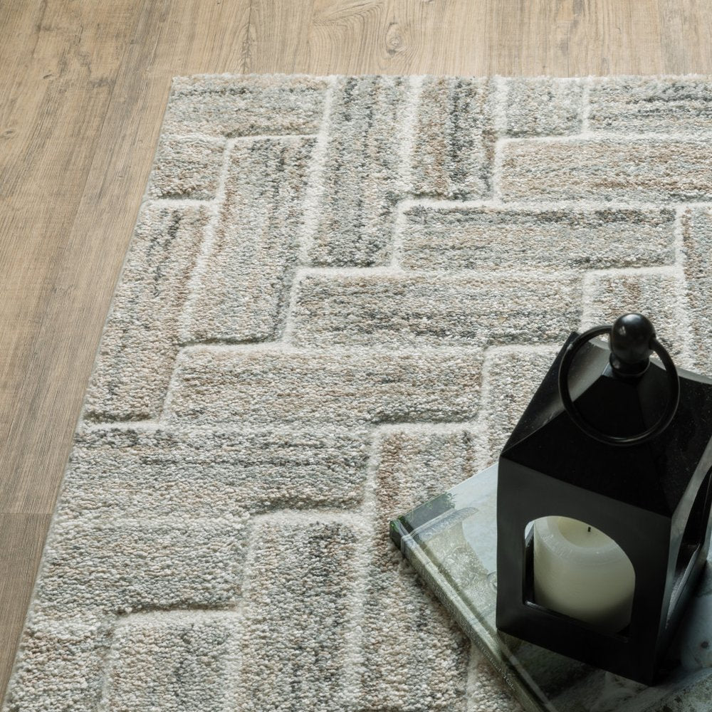 7' X 10' Ivory And Beige Geometric Area Rug