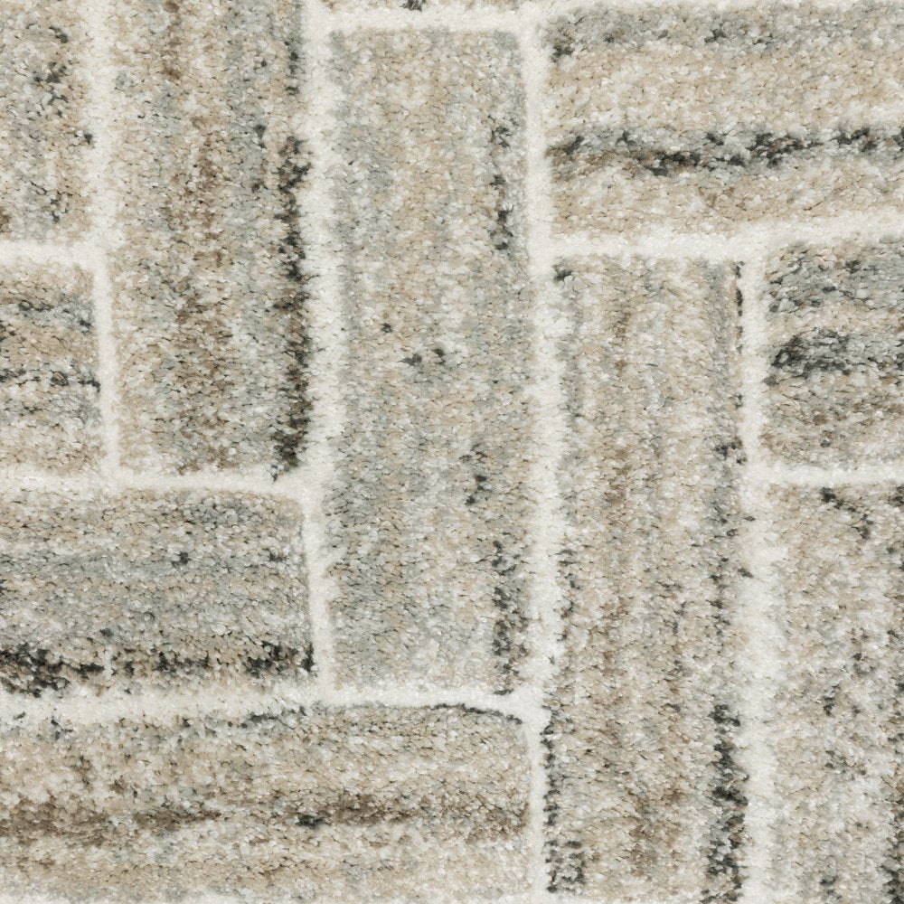 7' X 10' Ivory And Beige Geometric Area Rug