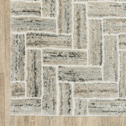 7' X 10' Ivory And Beige Geometric Area Rug