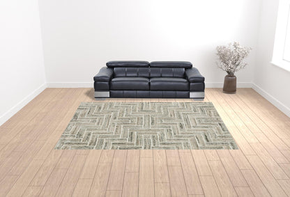 10' X 13' Ivory Beige Grey Brown Pale Blue And Charcoal Geometric Power Loom Stain Resistant Area Rug