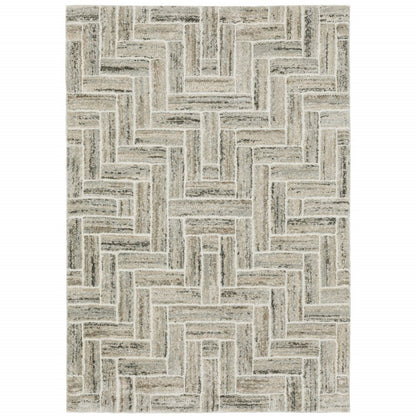 10' X 13' Ivory Beige Grey Brown Pale Blue And Charcoal Geometric Power Loom Stain Resistant Area Rug