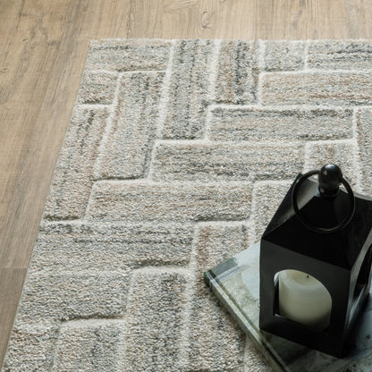 10' X 13' Ivory Beige Grey Brown Pale Blue And Charcoal Geometric Power Loom Stain Resistant Area Rug