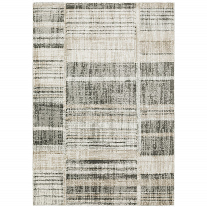 3' X 5' Grey Charcoal Ivory Tan Brown And Beige Geometric Power Loom Stain Resistant Area Rug