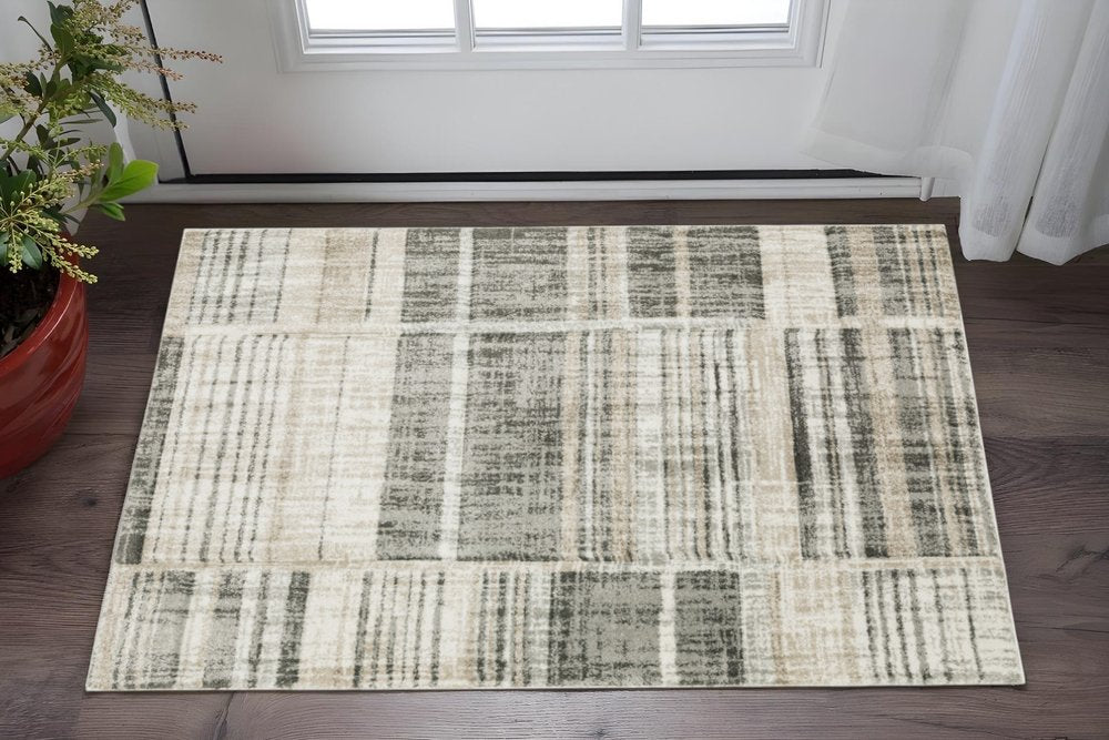 3' X 5' Grey Charcoal Ivory Tan Brown And Beige Geometric Power Loom Stain Resistant Area Rug