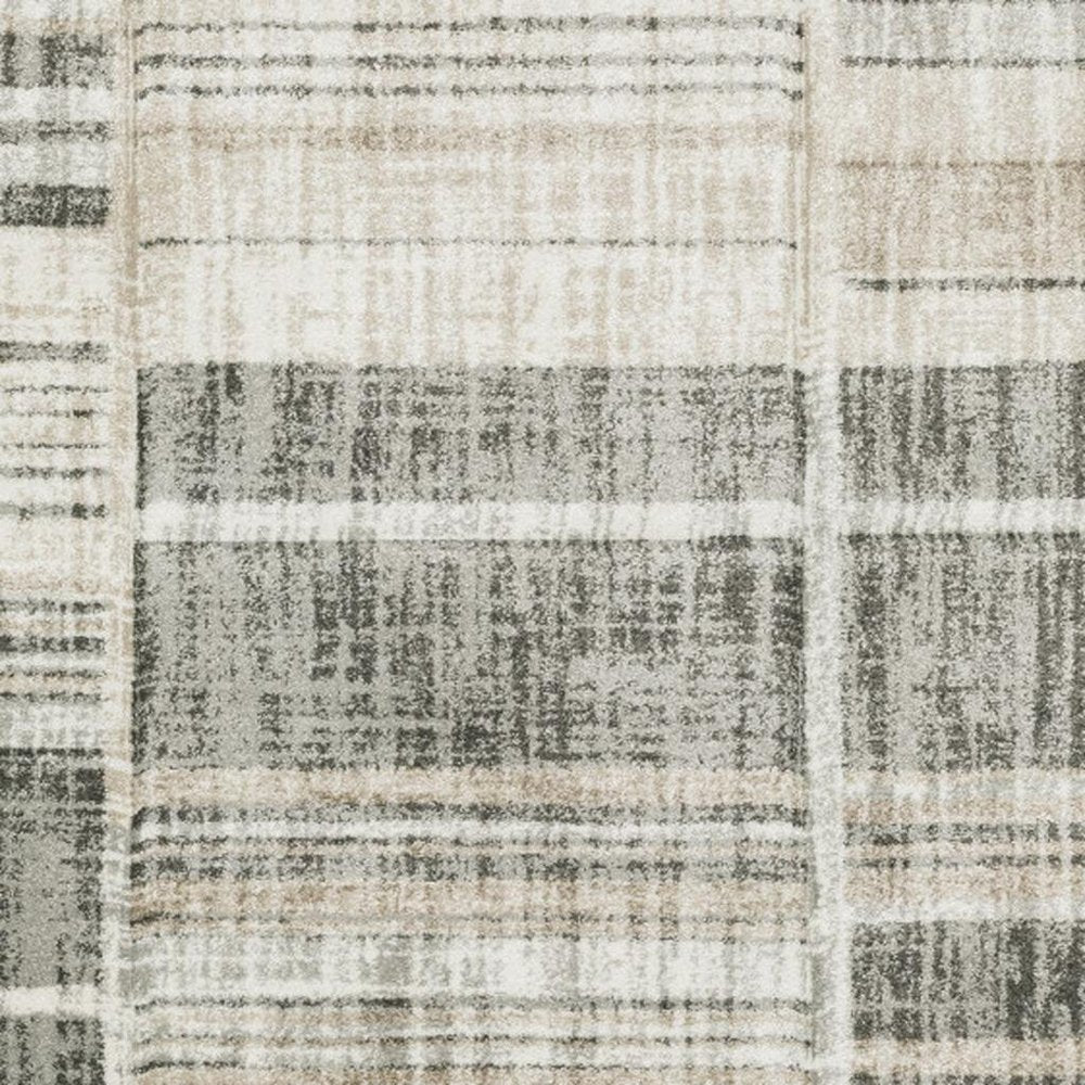 8' X 11' Grey Charcoal Ivory Tan Brown And Beige Geometric Power Loom Stain Resistant Area Rug