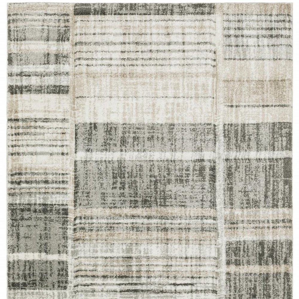 10' X 13' Grey Charcoal Ivory Tan Brown And Beige Geometric Power Loom Stain Resistant Area Rug