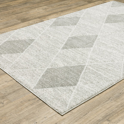 5' X 8' Grey And Ivory Geometric Power Loom Stain Resistant Area Rug