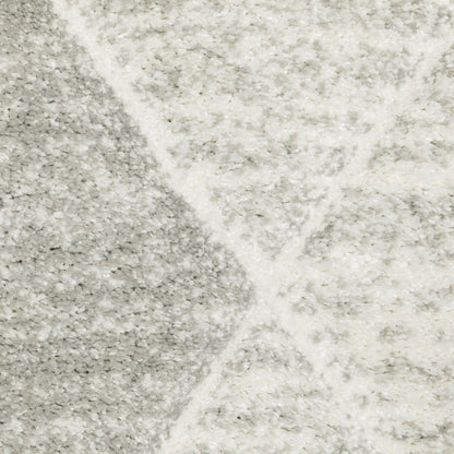 7' X 10' Gray And Ivory Geometric Area Rug