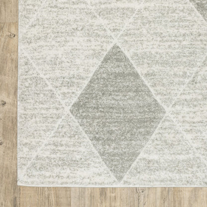 7' X 10' Gray And Ivory Geometric Area Rug